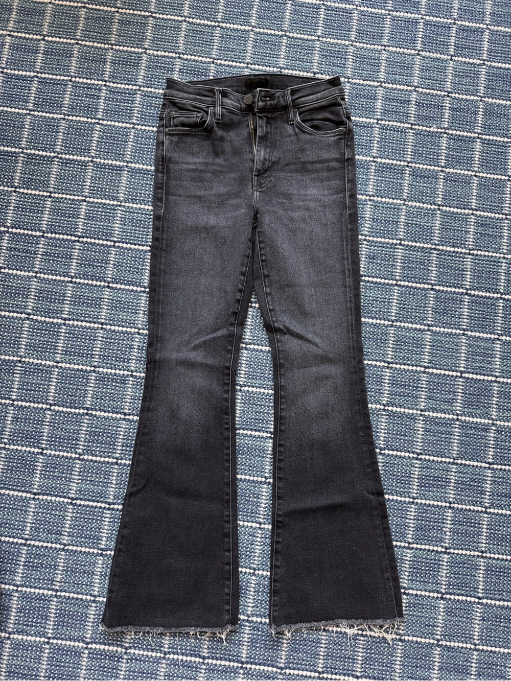 MOTHER  The Weekender Black Flare Jeans with Raw Hem